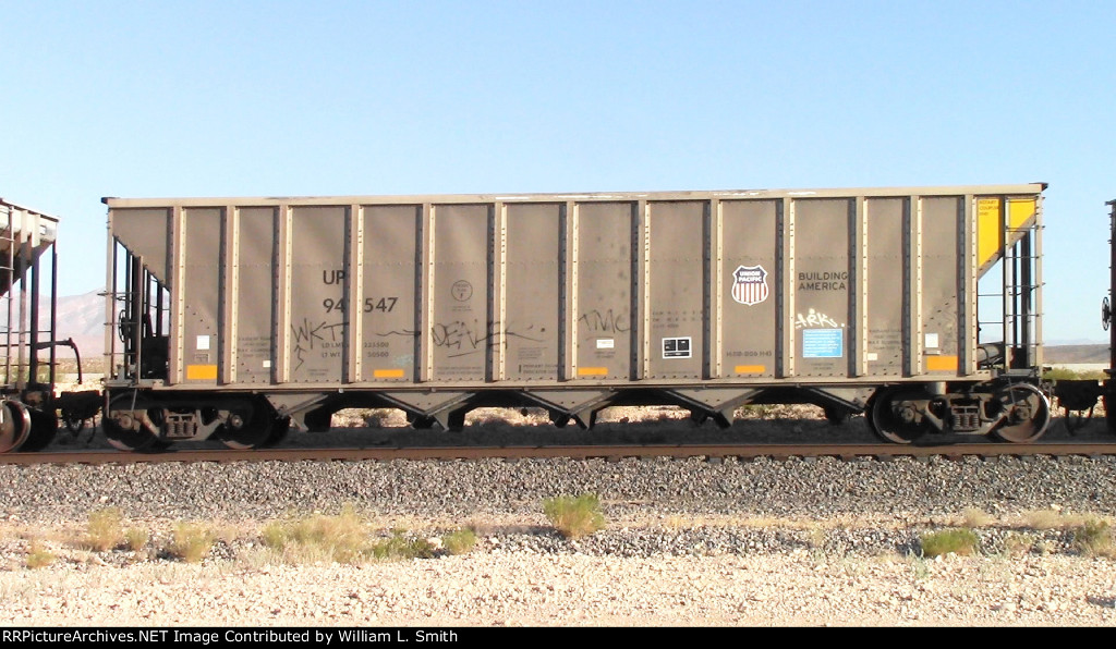 WB Unit Loaded Hooper Frt at Erie NV W-MdTrnSlv-Pshrs -145